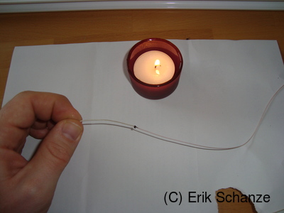 Schnüre mit einer Flamme aneinanderschweißen